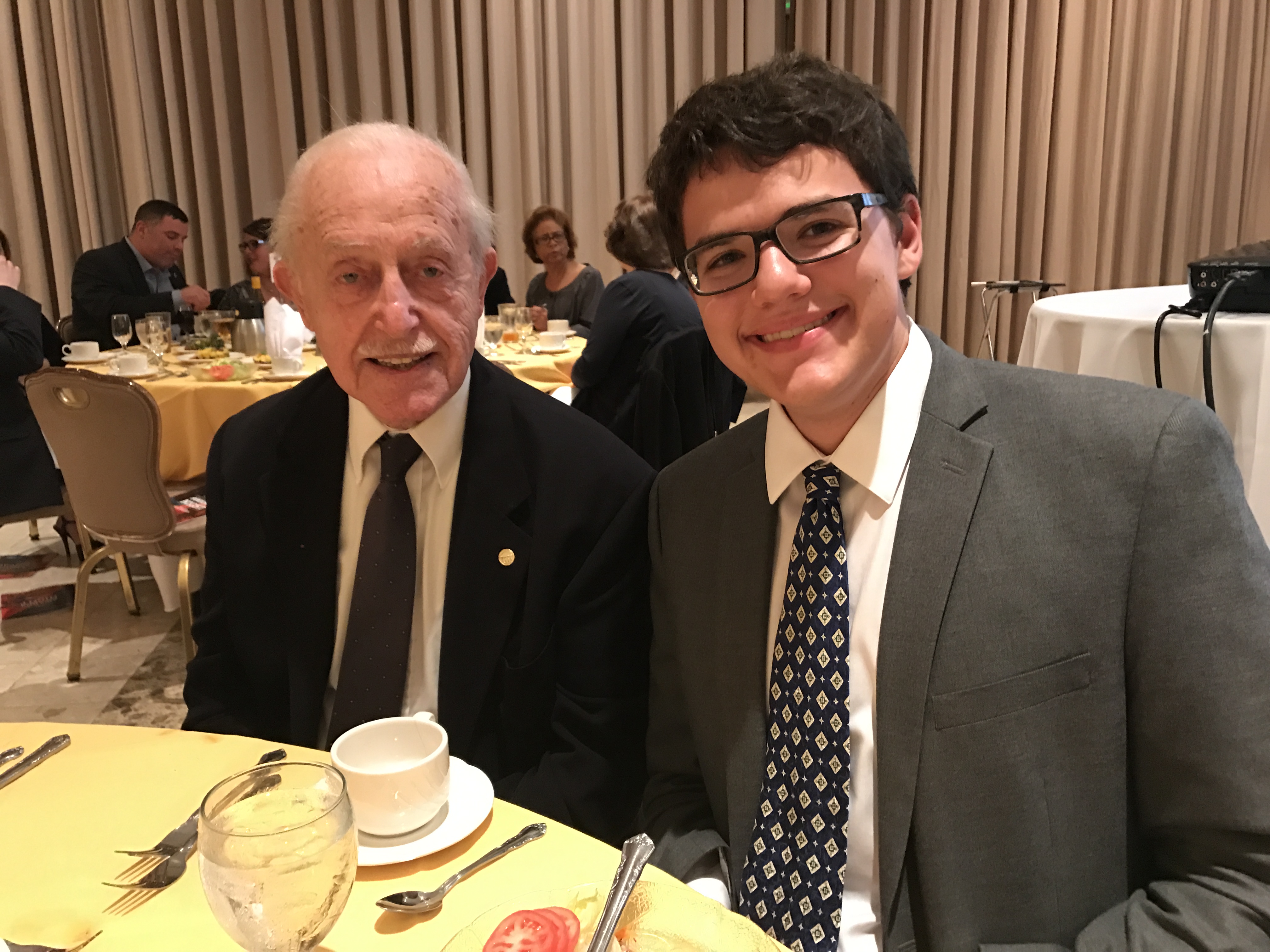Corey Doyen, George Cotter Scholarship recipient, enjoys the May awards event with scholarship namesake George Cotter, a former chief scientist at the National Security Agency.