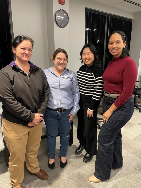 Members of the chapter's Women in AFCEA group pause for a group photo during the Holiday Social in December.