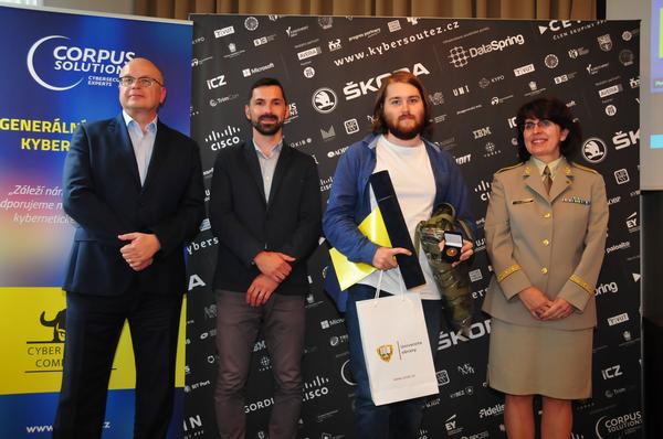(from l-r) Pribyl, Fendrych, Jan Kucera, high school category winner, Gen. Smerdova, pause for a photo opportunity at the July award ceremony.