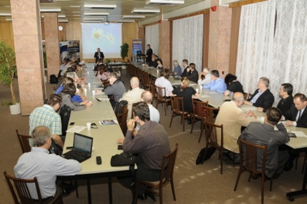 In June, experts listen to a speaker at the 47th Security Seminar, focused on Multimedia Communication & Security.
