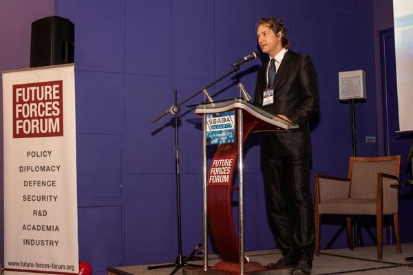 Tomas Muller, chapter president, welcomes attendees to the November conference.