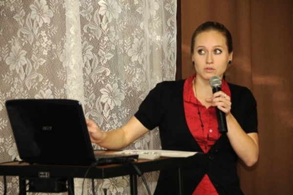 Alena Pejcochova, a student at the Police Academy, Czech Republic, speaks on cell phones as evidence in crime investigations during the Security Seminar in June.
