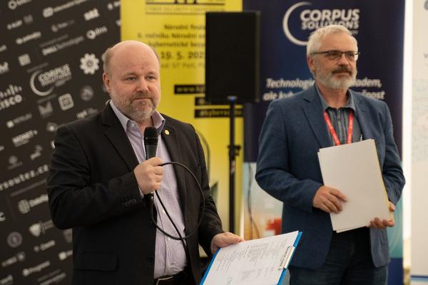 Petr Jirasek, regional vice president, Central Eastern Europe, and chairman of the Czech National Cyber Competition, and Josef Strelec, director, Czech Cyber Center, present during the ceremonial award event in May.
