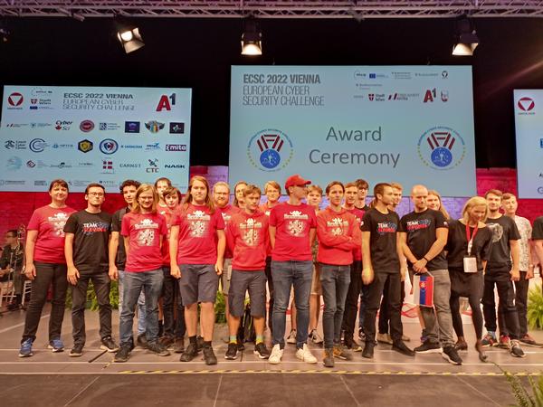 In September, the Czech Cyber Team and Team of Slovakia stand together during the competition.