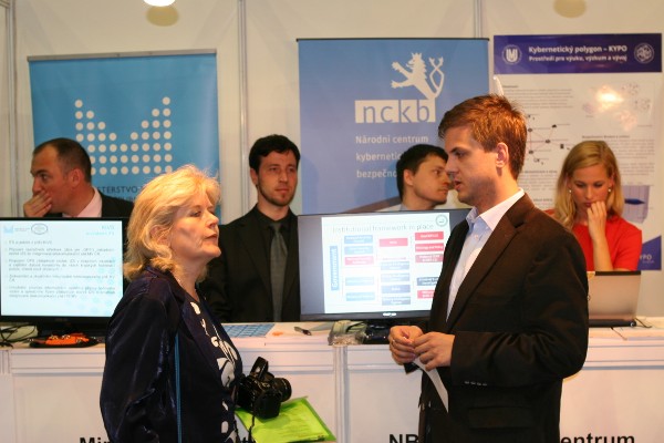 Alena Řezníčková (l), chapter secretary, speaks with demo participants at the May event.