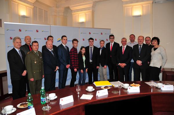 Student competitors in the South Moravian region receive honors in November from their teachers as well as AFCEA and regional representatives. Pictured from left are teacher Roman Kolacny; Vladimir Simicek, director, High School Cichnova; Lt. Col. Petr Hruza, University of Defence and chapter representative; Jirasek; Jan Vykopal, Masaryk University; Tomas Lostak, High School Cichnova; Tomas Rottenberg, Gymnazium Boskovice; Adela Pospisilova, Gymnazium Znojmo; Pavel Jakubec, High School Cichnova; Michal Urbanek, High School Cichnova; Roman Hlavaty, Technical High School Brno; Jan Vitula, deputy governor of the South Moravian region; Frantisek Varacha, Gymnazium Znojmo; Jiri Zednik, Technical High School Brno; Petr Drahos, Gymnazium Boskovice; and Marie Potuckova, High School Cichnova.