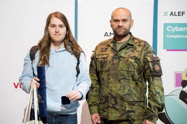 The competition winner, Jan Kucera and Brig. Gen. Miroslav Feix, commander, Czech Army Cyber Command, pose for a photo at the April event.