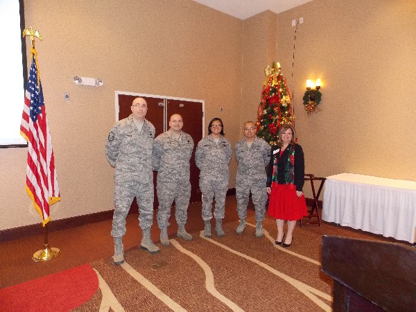 Enlisted Scholarship Assistance recipients recognized in December are (l-r) Master Sgt. Russell Yakim, USAF, National Air and Space Intelligence Center (NASIC); Master Sgt. Charles Gibson, USAF, NASIC; Tech. Sgt. Eleanor Blystone, USAF, Air Force Institute of Technology (AFIT); and Master Sgt. Carlos Frevert, USAF, chapter vice president of enlisted affairs, along with Linda Skinner, chapter president.

