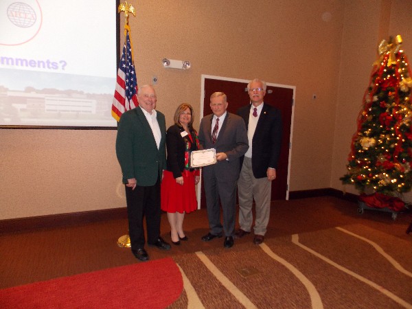 Together at the December luncheon are (l-r) Fred Schyed, regional chair; Linda Skinner, chapter president; Maj. Gen. Todd I. Stewart, USAF (Ret.), Ph.D., director and chancellor, Air Force Institute of Technology; and Rick Weggmann, board chair.