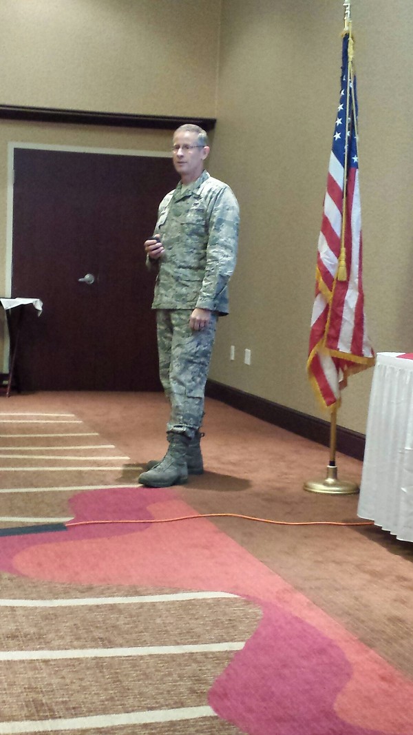 Col. Gregory Schnulo, USAF, commander of the 178th Fighter Wing, Springfield Air National Guard Base, Ohio, speaks to November luncheon attendees on mission work between Wright-Patterson Air Force and Springfield Air National Guard bases.