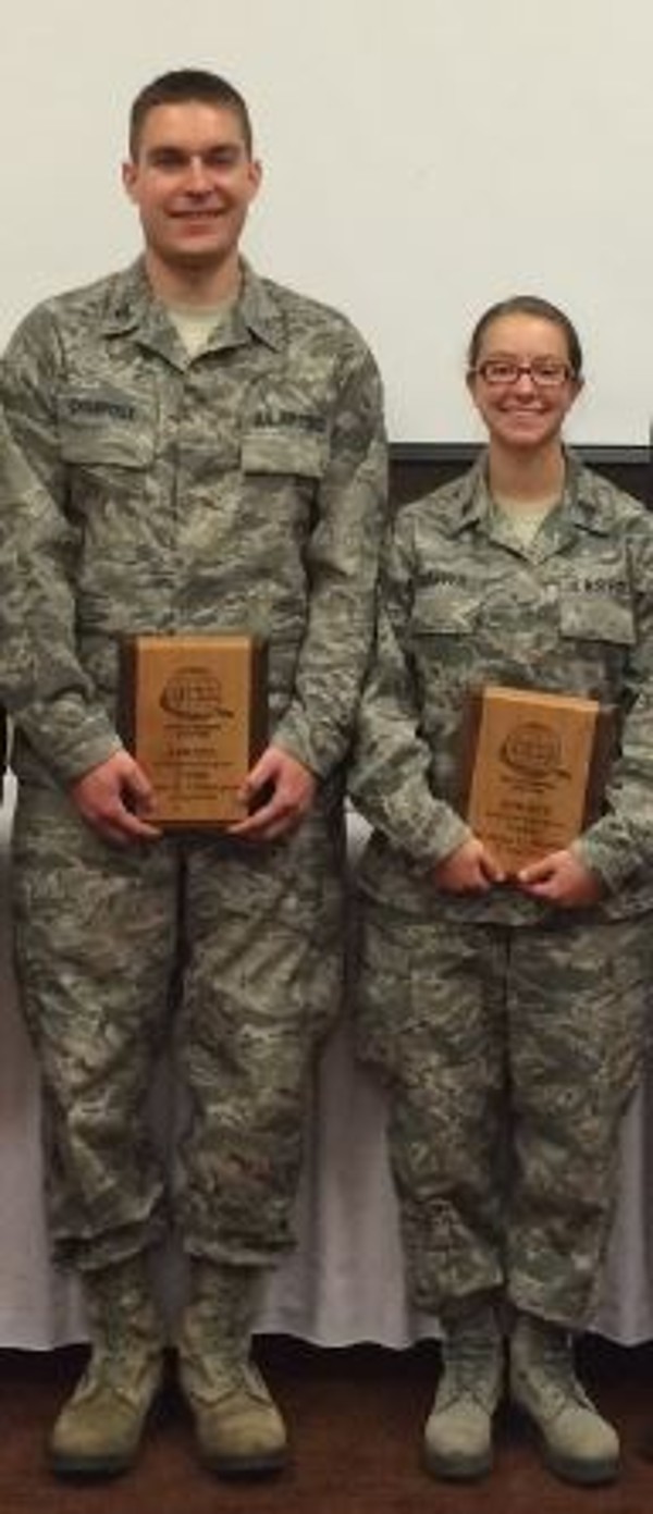 Air Force ROTC (AFROTC) Cadets Grant E. Champoux and Melissa L. Shaffer receive their scholarship awards in April. Cadet Champoux has supported chapter luncheons as part of the color guard teams. Cadet Shaffer also finds time to give back by speaking to and serving as a role model for up-and-coming science, technology, engineering and mathematics (STEM) students and supporting AFROTC recruiting events.