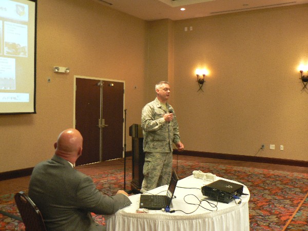 Col. Eugene Henry, USAF, chief of staff, Air Force Research Laboratory, speaks to more than 200 chapter members during the September luncheon.