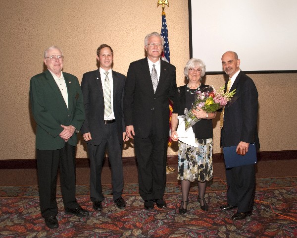 Chapter officers joining together at the March meeting are (l-r) Fred Scheyd, regional vice president; Casey Weinstein, Young AFCEAN; Chuck Wegman, chairman of the board; Lynn B. Moad, retiring chapter board member; and Dan Curtis, chapter president.