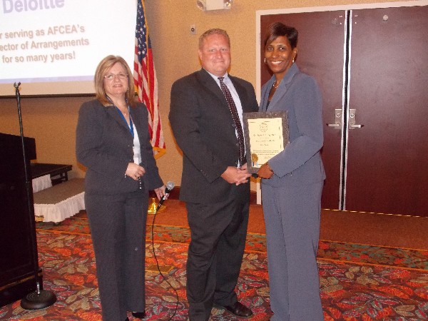 In August, the chapter's newest Life Member, Jacqueline Gamblin (r), receives her commemorative certificate of recognition from Linda Skinner, chapter president, and the chapter member chair.
