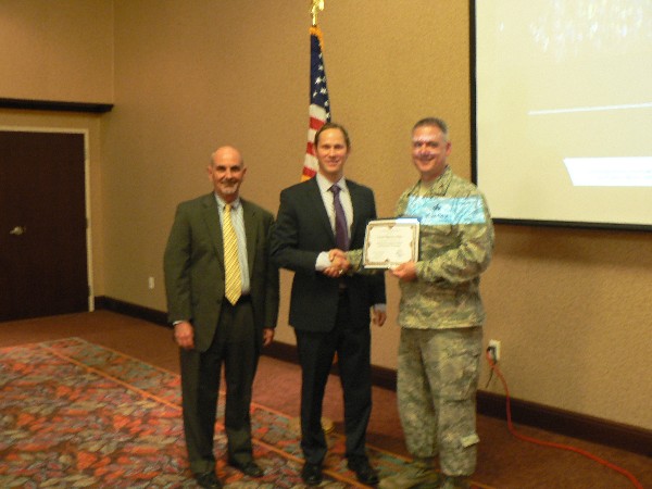 Gathering at the September luncheon are (l-r) Curtis, Weinstein and Col. Henry.