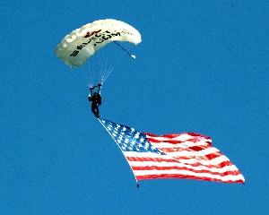 David Hart, chapter president, makes a grand entrance to the chapter's Spring Scholarship Golf Tournament—skydiving to the first tee at the NCR Country Club in July.