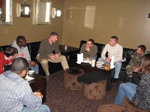 December guest speaker and White House Fellow Lt. Col. Rob Lyman, USAF (4th from l), meets with the chapter's Young AFCEANs at an after-lunch knowledge sharing event.