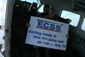 In November, David Hart, chapter vice president for networking, took Col. Kenneth J. Moran, USAF, program executive officer for both the Expeditionary Combat Support System (ECSS) and Logistics Information Technology Systems at Wright Patterson Air Force Base, Ohio, and Capt. Scott Smith, USAF, 88th Air Base Wing and Purple Heart recipient, for tandem skydives as a high-altitude salute to the military. Col. Moran held a sign in the airplane promoting the first "Go Live" of ECSS next summer.