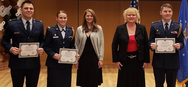 At Wright State University's Detachment 643 Awards Ceremony in April, Yvonne Vermillion, chapter executive vice president (center l), and Carrie Taylor, education committee lead (center r), present the ROTC scholarships to Richard Feustel, Cedarville University; Emily Rosen, Wright State University; and Jonathan Trainer, Cedarville University.
