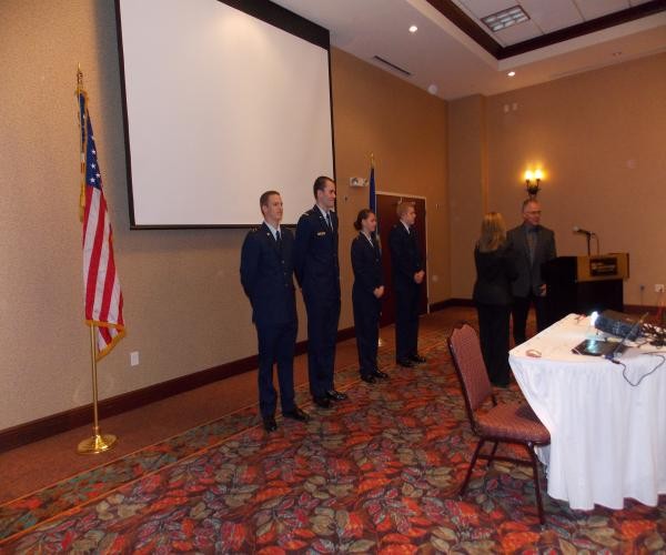 DAYTON-WRIGHT— Members of Air Force ROTC Detachment 643 at Wright State University are presented with AFCEA coins in April. Pictured from left are cadets David Robinson, Joseph Franklin, Emma Remsen, and Cam Grim.