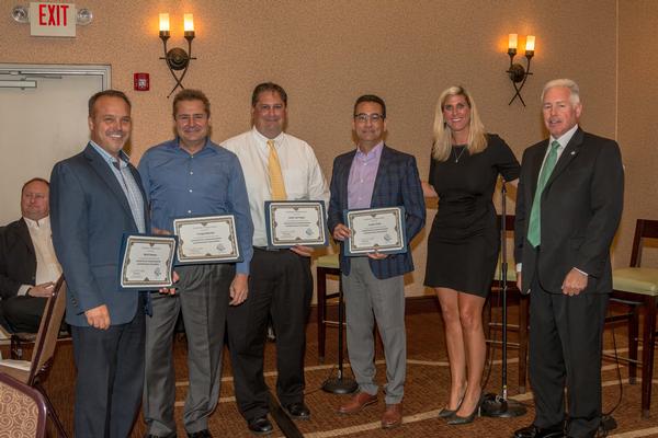 At the August luncheon, presenters and chapter members (l-r) Mark Human, moderator, president and CEO of HumanIT; Craig Kabealo, Development Consultants, Inc.; John Garringer, USAF AFMC AFLCMC/HIQ; Lenny Getts, USAF AFMC AFLCMC/HNII; Joni Ahlers, chapter vice president; and Dodds, pause for a photo.