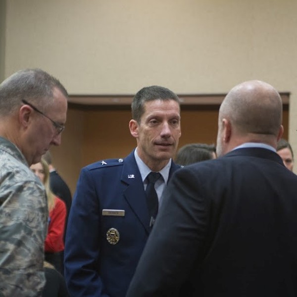 Hart thanks Gen. Skinner with a chapter certificate after his luncheon presentation in December. 