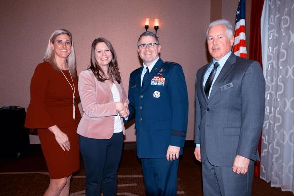 During the February luncheon with Gen. Cooley (c), chapter officers (l-r) Joni Ahlers, programs vice president, Yvonne Vermillion, chapter vice president, and David Dodds, chapter president, pause for a photo.