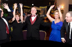 Chapter members enjoy the Valentine's Charity Ball in February, which raised scholarship funds for local students.