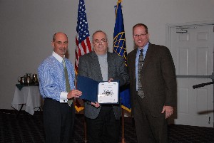 Judson (r) and Daniel Curtis (l), chapter vice president for programs, present a certificate of appreciation to William McQuay, a technical adviser at the Air Force Research Laboratory at Wright-Patterson Air Force Base, Ohio, for serving as the May keynote speaker.