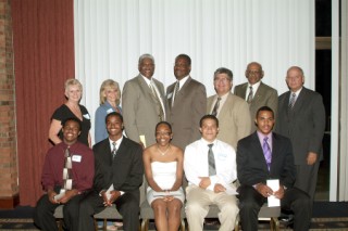 At the June awards, Dr. Walter McAfee Scholarship recipients appear with chapter presenters and officers of the Zeta Epsilon Lambda chapter of the Alpha Phi Alpha fraternity, which helps with the scholarship selections.