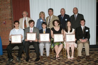 Science fair winners pose with chapter members and science fair co-chairmen at the June annual education awards.