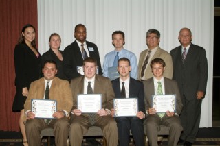 Young AFCEAN grant winners receive congratulations from banquet attendees and chapter Young AFCEAN co-vice presidents at the June awards.