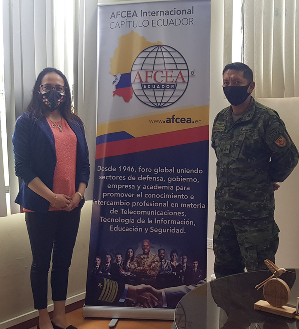 (I-r) María Dolores Santos, chapter president, poses for a photo with Lt. Col. Manuel Alfonso Querembás Altamirano,director of the army's Centro de Educación Militar (CEDMIL), at a May meeting.