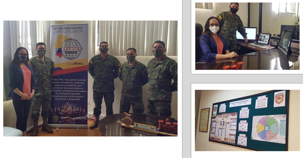 In May, the Military Education Center work team poses with Santos.