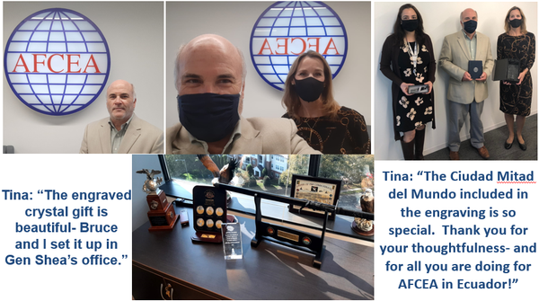 In upper right photo, in September, Brenda Puch, corporate member coordinator, AFCEA International (l), poses for a photo with Schulte and Jordan. In lower photo, Jordan and Schulte set up the engraved crystal gift in the office of Lt. Gen. Robert M. Shea, USMC (Ret.), CEO and president, AFCEA International.