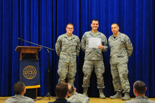 Senior Airman Ricardo Hernandez, USAF, is the recipient of the chapter's Fall 2015 Senior Master Sgt. Marcus Hall STEM Scholarship. Pictured (l-r) are Airman 1st Class Matthew Smith, USAF, chapter Young AFCEAN Affairs Chair; Senior Airman Hernandez; and Senior Master Sgt. William Hebb, USAF, chapter president.