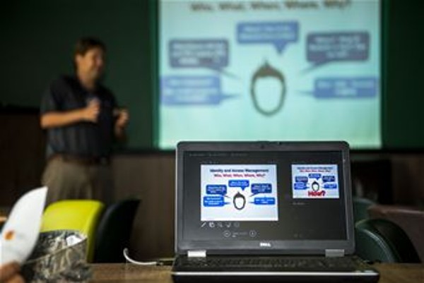 A technology industry representative gives a presentation to members of the Spangdahlem community during the Tech Expo in July.