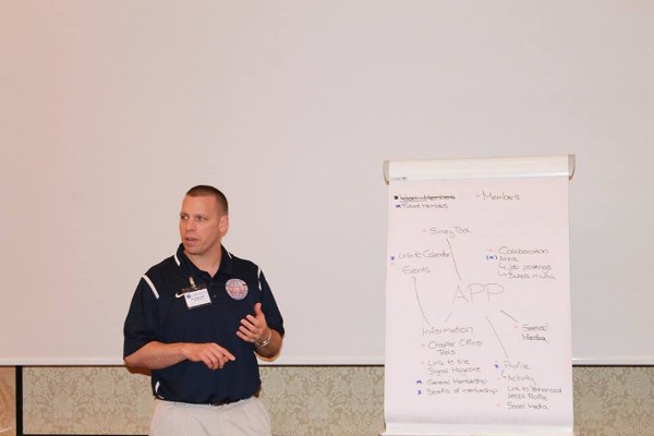 In October, Chapter President Senior Master Sgt. William Hebb, USAF, answers questions during an app development exercise at the first European Young AFCEAN Conference in Berlin.