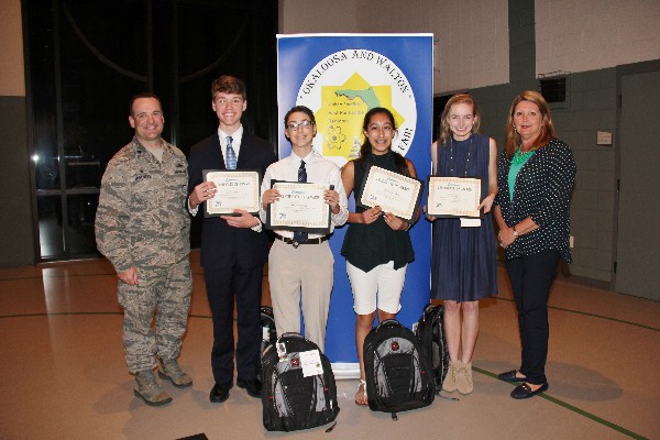 Attending the Northwest Florida Regional Science in February are (l-r) Chapter President Lt. Col. Scott McGovern, USAF, commander, 1st Special Operations Communications Squadron; Daniel Bobbit; Logan Thursby; Victoria Salvadore; Camile Miles; and Scholarship Chairperson Carol Joyner.
