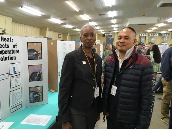 Judges Glenda Robinson and Luke Colinco pause for a photo at the February event. 