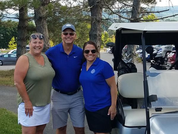 Karen Moncada, Carl Militello and Rosanne Pelli, all of
whom work for Air Force Research Laboratory, enjoy the chapter's golf event in August.