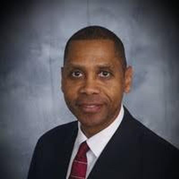 Rick Lockridge, former chapter president, receives thanks for his service at the chapter's January meeting.