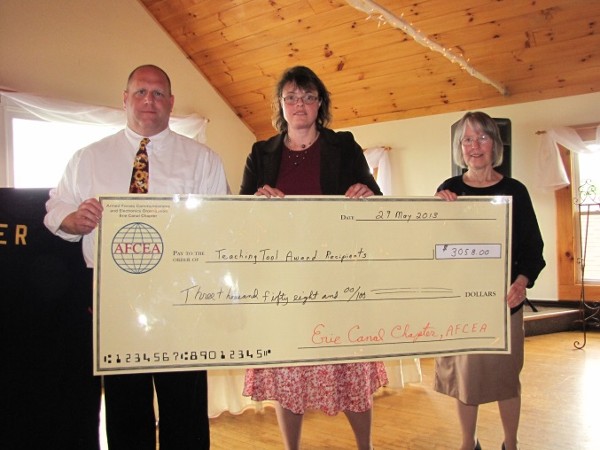 Teaching Tool Award winners together in May are (l-r) Michael Comet, South Lewis Central School; Anne Huntress, South Lewis Central School; Sandra Engle, Rome Catholic School; and Douglas Andrews, Holland Patent Central School (not pictured).