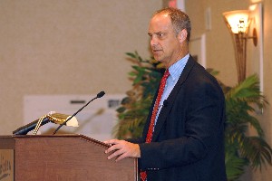 Carl R. Siel, chief systems engineer for the assistant secretary of the Navy for research, development and acquisition, gives a presentation titled 