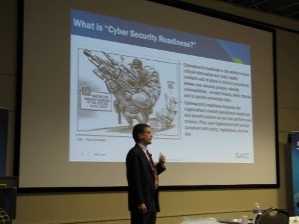 Charles Onstott, vice president and service line manager for SAIC's cybersecurity, cloud computing and data science services, speaks to the chapter in September.