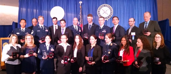 Mandi Septer (l) accepts several Young AFCEAN awards on behalf of the chapter at the West conference in February, including the Distinguished Young AFCEAN Award in recognition of her efforts.