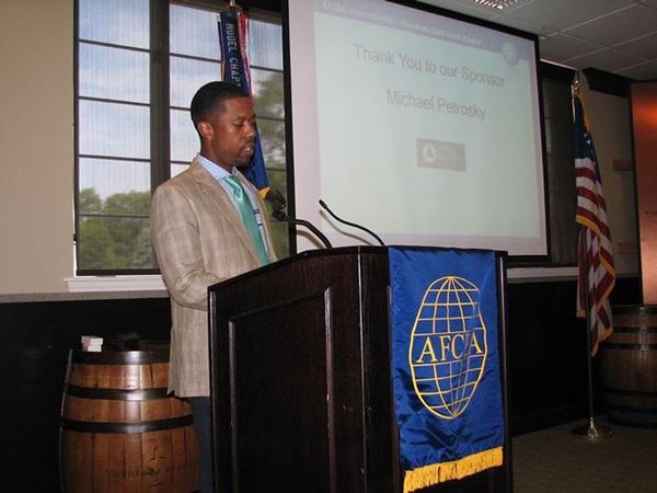 Derek R. Massey, vice president, Young AFCEAN Affairs, thanks Waddell & Reed for sponsoring the event in July.