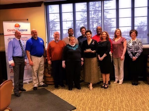 Posing for a photo with guest speaker and former Miss America Heather French Henry (c) are (from l-r) Martin Harbolt, chairman; David Hart, regional vice president; Michael Tague, treasurer; Derek Massey, chapter vice president of programs; Karen Barry, chapter executive secretary; Richard Roda, chapter executive vice president; Domanic Ledbetter Sr., chapter vice president of operations; Angela Alexander-Mendoza, chapter president; Jessica Camacho, vice president of membership; and Gina Dowell, vice president of Women in AFCEA, at the Women in AFCEA event in March sponsored by CoreSys Federal.