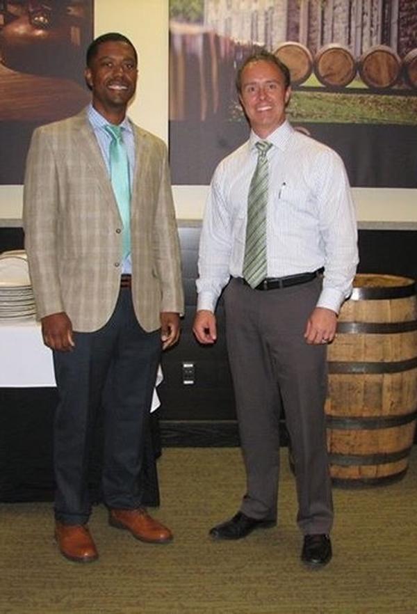 Massey networks with guest speaker Mike Petrosky, financial adviser, Waddell & Reed, after his financial strategy presentation during the chapter’s Young AFCEAN Lunch and Learn event in July.