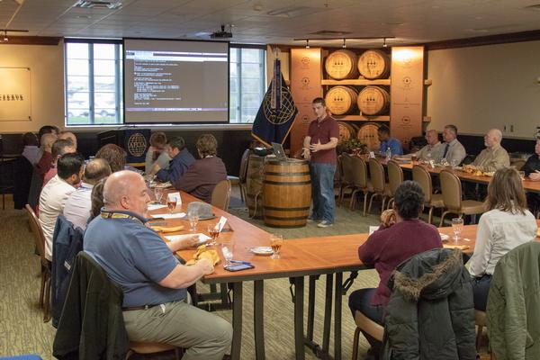 Dodd speaks about Docker, a container platform, at the chapter's April Lunch and Learn event.